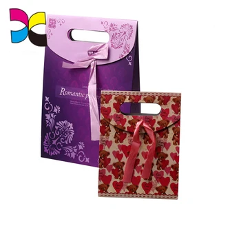 small purple gift bags