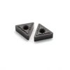 Dependable carbide cutting inserts for medium light application of stainless steel