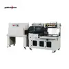 Automated shrink wrapping machine