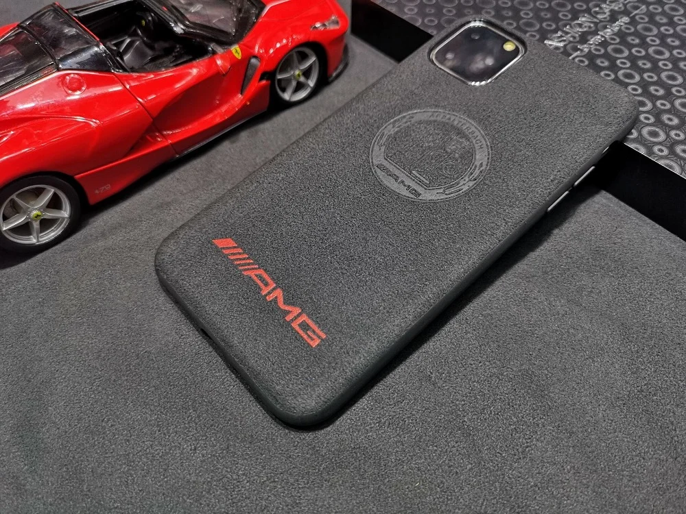 Custom most durable embossed Flipping Fur Suede car logo series mobile phone case plain mobile cover for iphone