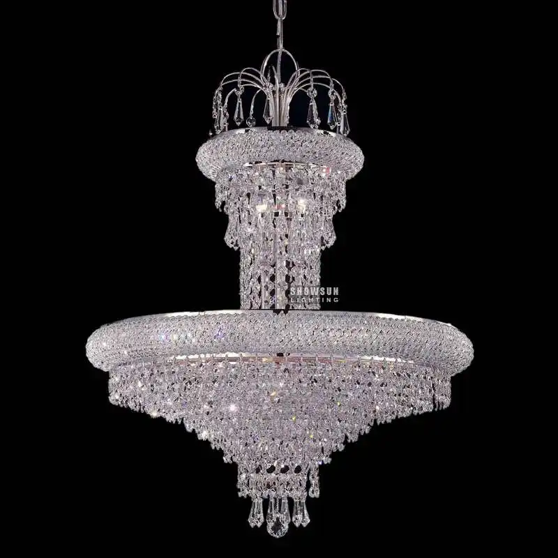 Contemporary chrome crystal chandeliers lighting hotel foyer