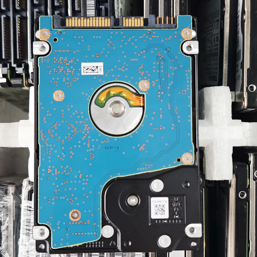 Close-up of SATA connector and mounting screw holes on a 2.5-inch HDD