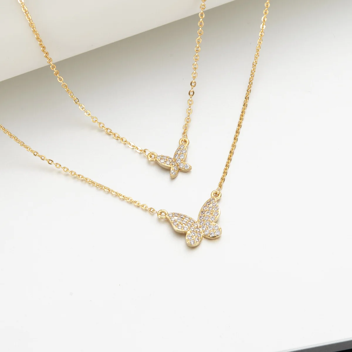 Download European Style Classic Gold Color Bright Zircon Mosaic Butterfly Pendant Ladies Double Layered Necklace Buy 18k Gold Plate Double Layered Choker Initial Necklace Diamond Double Zircon Chain Butterfly Necklace Jewelry Women