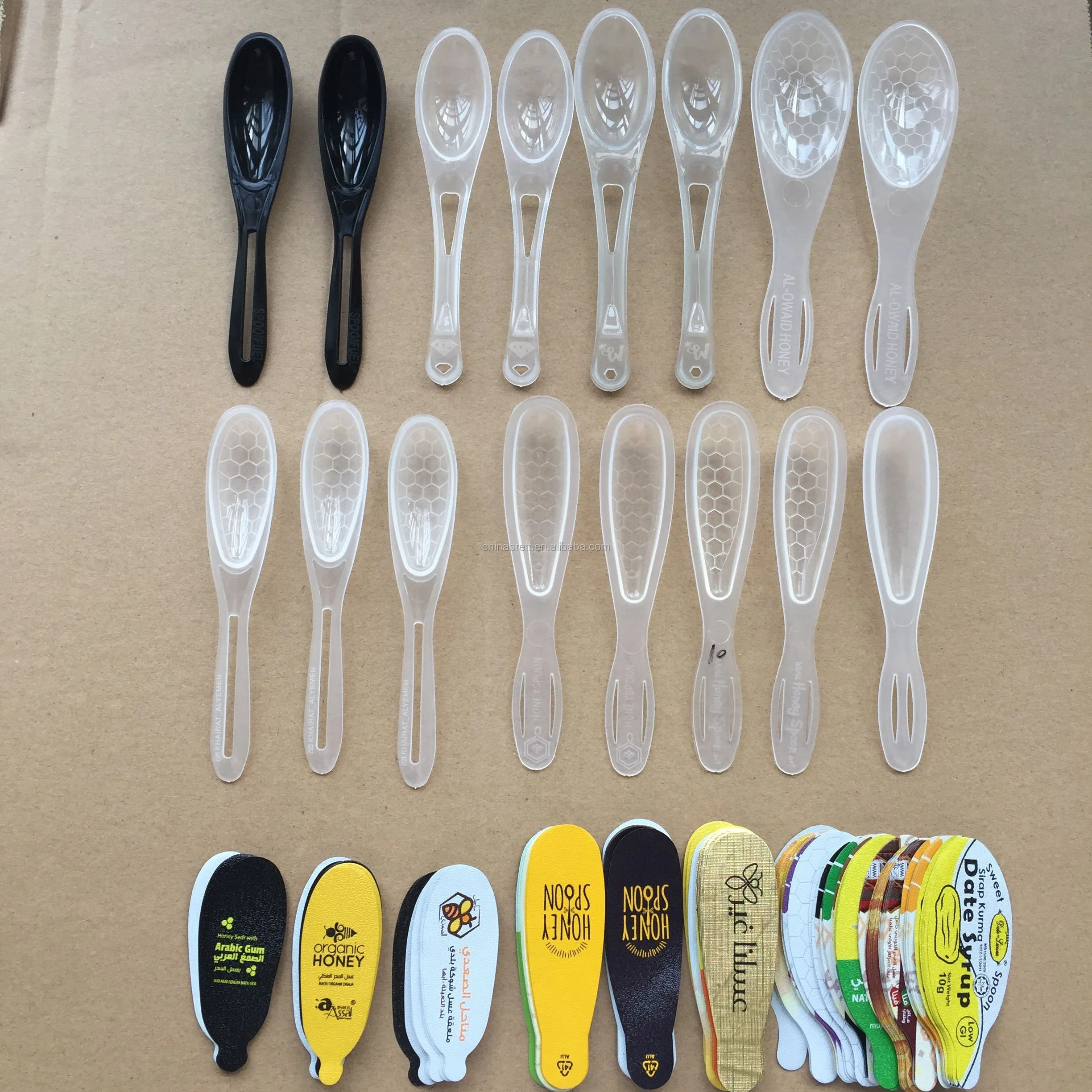 Hot selling 7g disposable foil seal wrapped plastic honey spoon wholesale