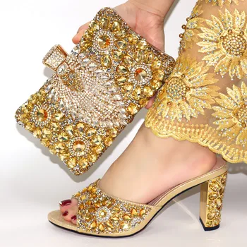 gold sandals and matching bag