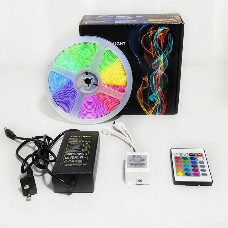 Supplier wholesale 5050 SMD RGB LED Strip Lighting Ribbon Lamp Tape 12V LED Ceiling Wall Light IR Controller and Power Adapter