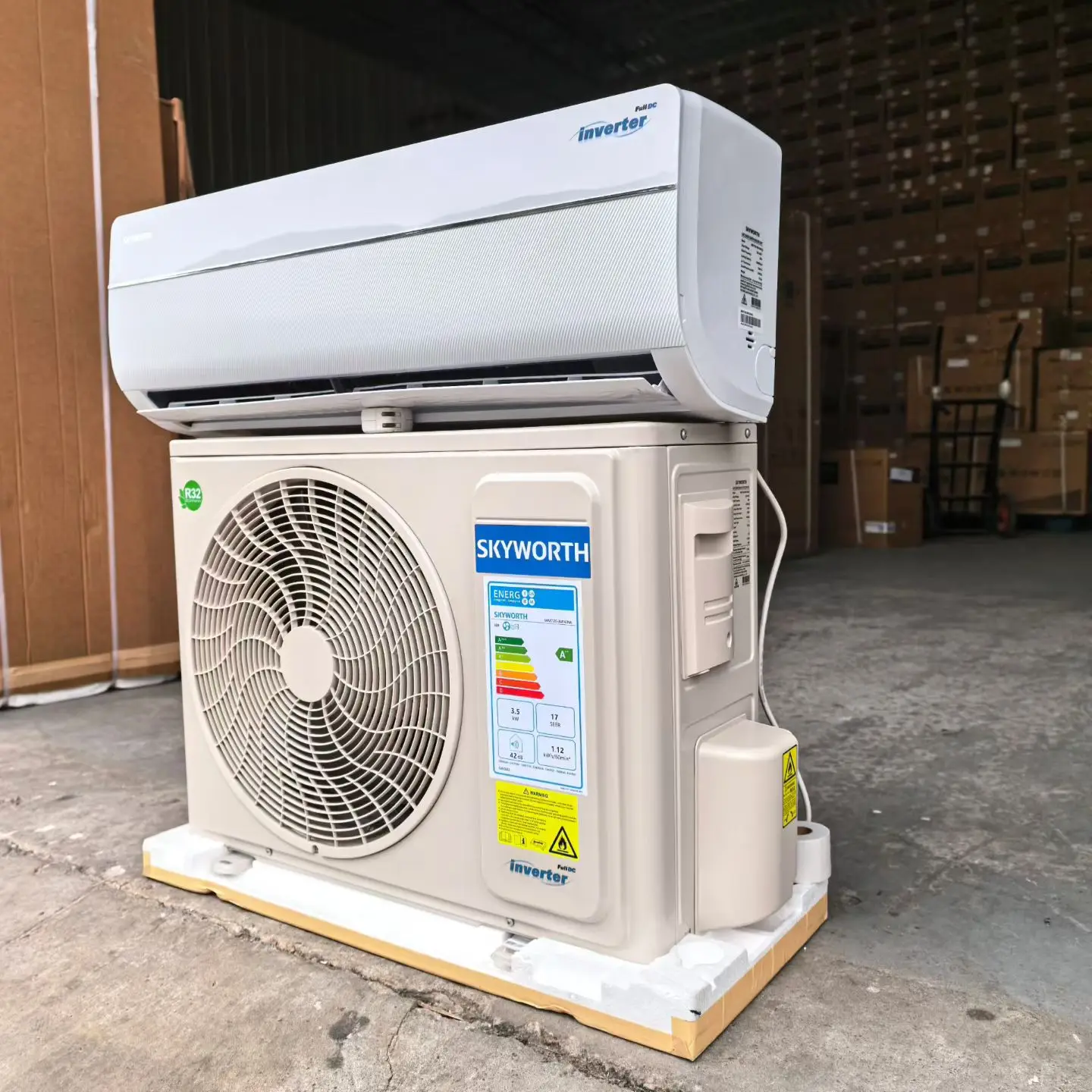Wall-mounted ductless split system indoor unit with slim profile and remote control