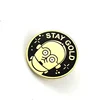 Wholesale metal stay gold eagle round souvenir badge pin