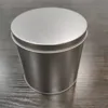 Custom cylindrical metal tin can food embossed plain metal tin box canister with lid