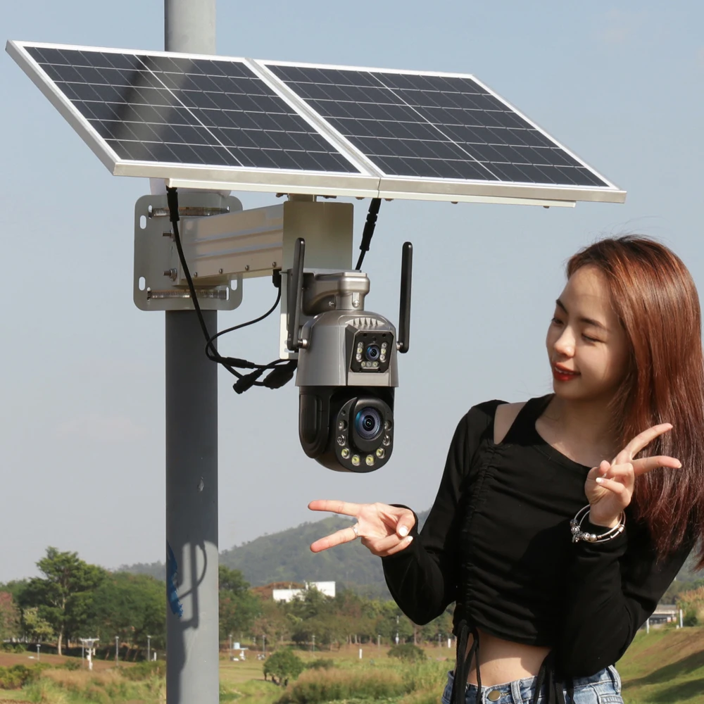 Solar-powered 100% wire-free security camera mounted on a wooden fence with small monocrystalline panel facing upward