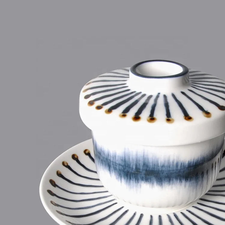 ceramic bright colored tea cups and saucers