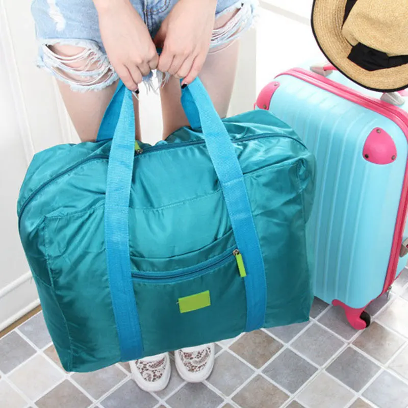 Wholesale low cost foldable versatile waterproof nylon luggage travel storage bag on sale