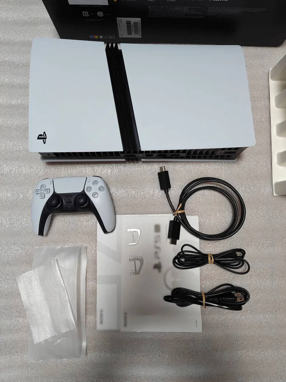 DualSense controller showing adaptive triggers and haptic motor zones