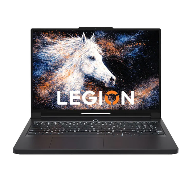 User reviewing a 17-inch Lenovo laptop while working on a dual-monitor setup with external peripherals