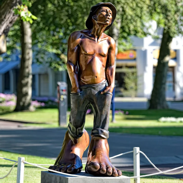 bronze blowing whistle statue