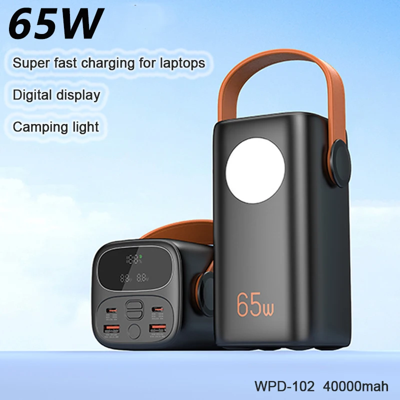 Portable laptop charger power bank with OLED display showing real-time 138W output to MacBook Pro