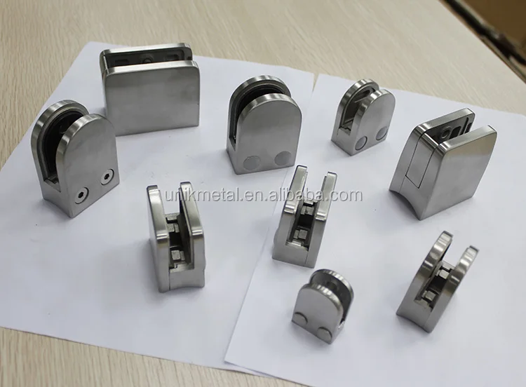 1stainless steel  interior curved glass wood stairs /punched hole metal railing/laminated glass glass stairs2.jpg