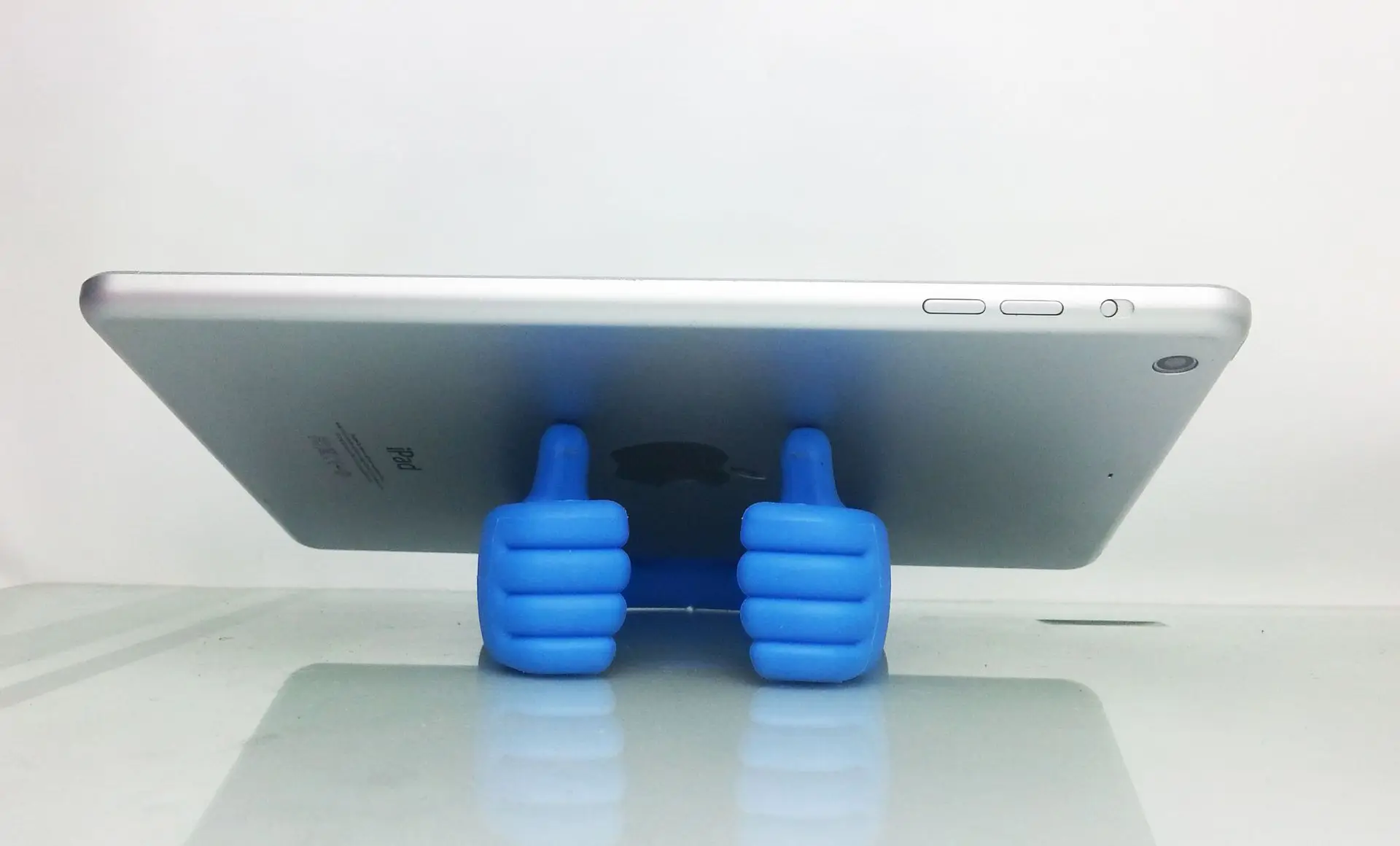 Portable thumbs up finger mobile phone stand