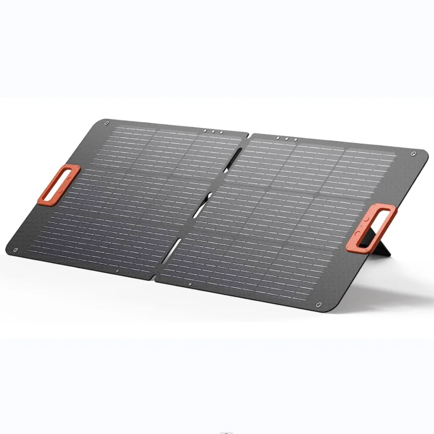 Bifacial 100W portable solar panel deployed on sandy ground capturing reflected light
