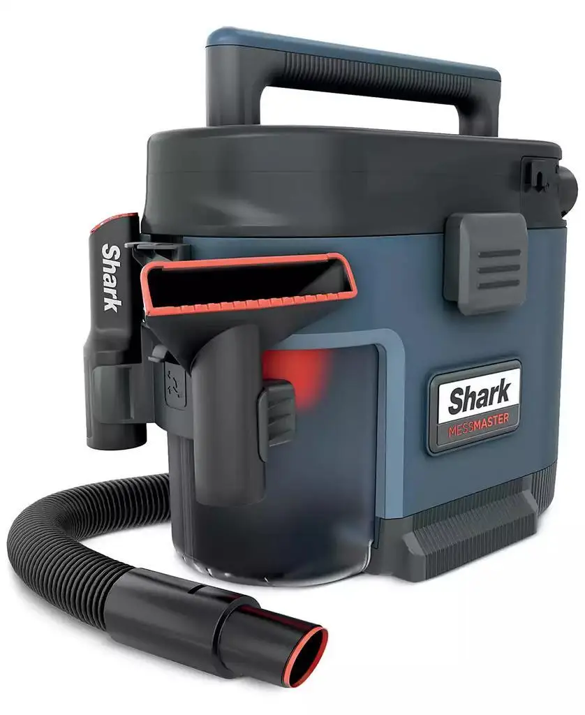 1-gallon shop vac mounted on wall next to tool rack