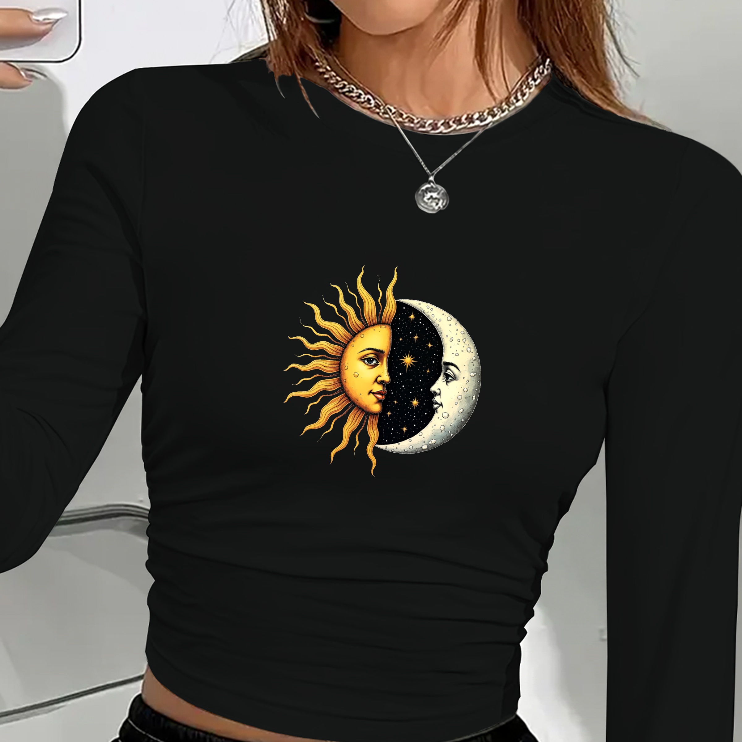 Women’s long sleeve shirt with artistic sun and moon faces print in a celestial boho design 01