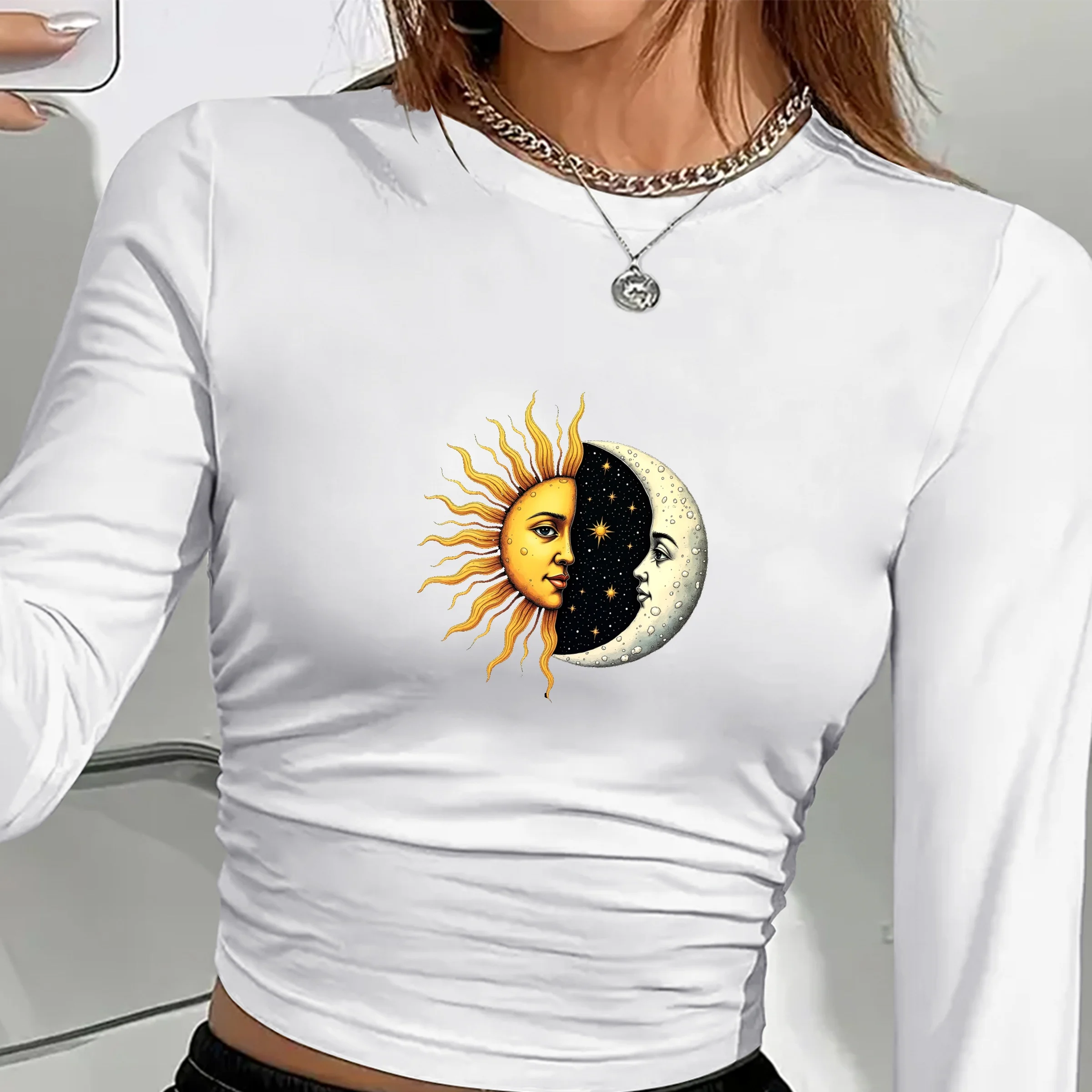Women’s long sleeve shirt with artistic sun and moon faces print in a celestial boho design white