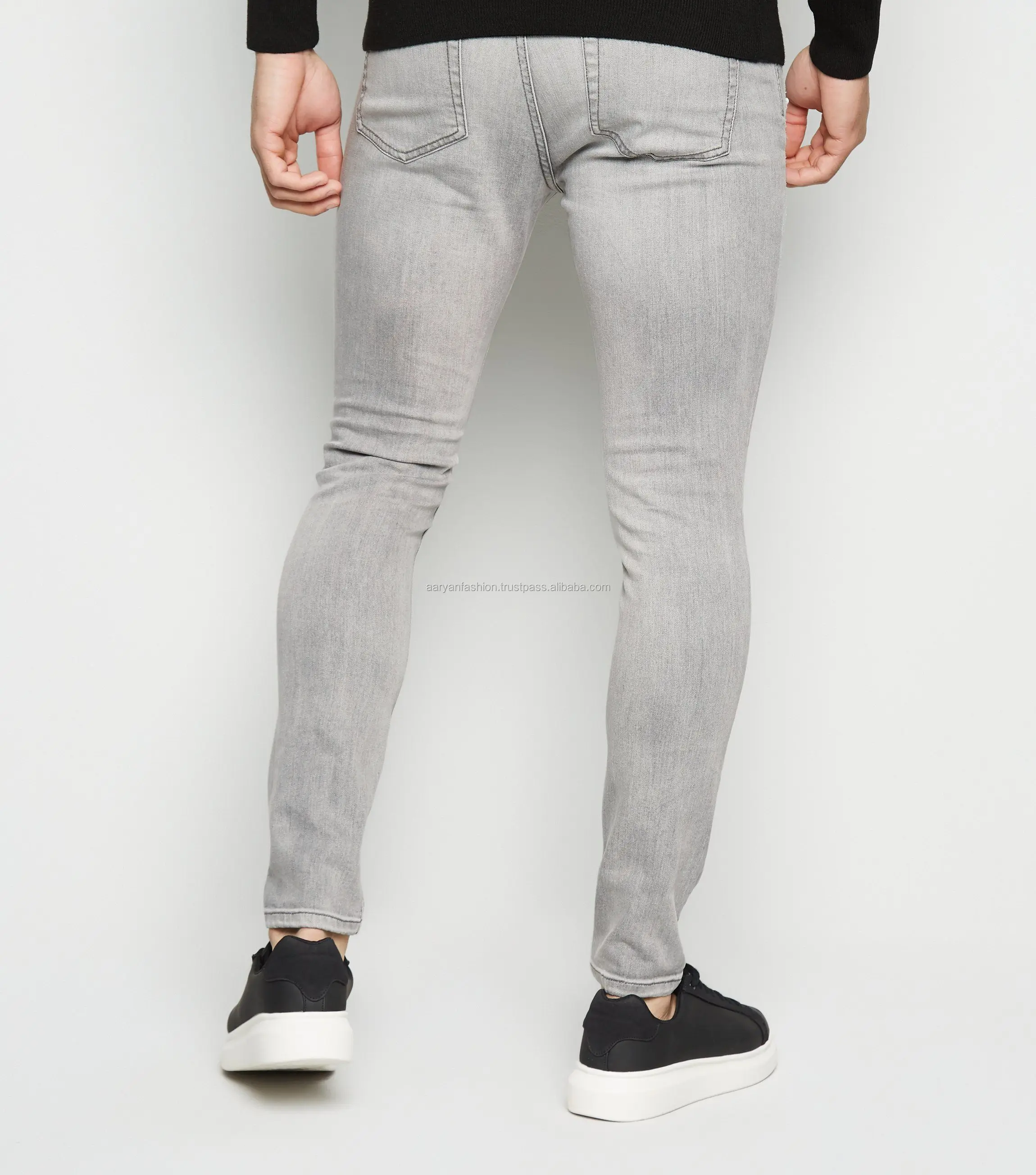 grey spray on skinny jeans