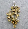 Citrine flower pendant in sterling silver prong setting for all occasions