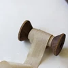 Multi-functional spool for metallic wrapping rope