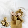 Hand-made metallic gold twine spool