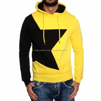 yellow hoodie black jeans