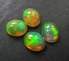 Top AAA Quality Natural Yellow Ethiopian Opal 8x12mm Oval Cabochon With Play Of Fire Loose Gemstone