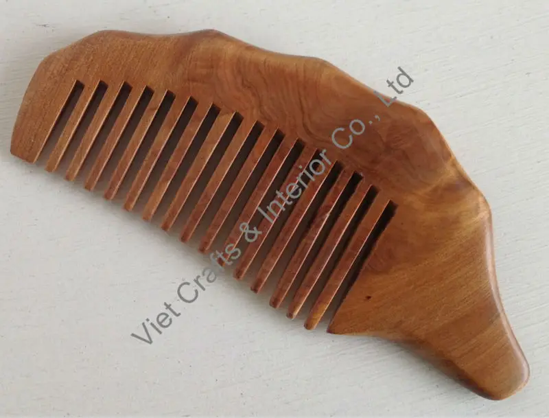 由条纹乌木制成的梳子.尺寸 12.5 × 5厘米