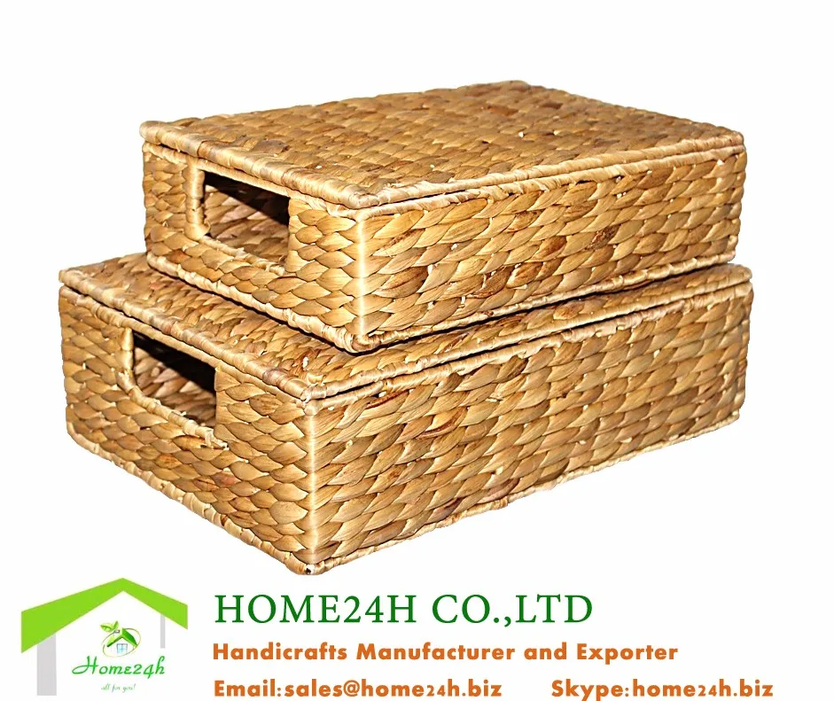 white wicker storage boxes with lids