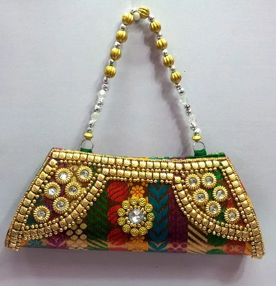 golden colour hand purse