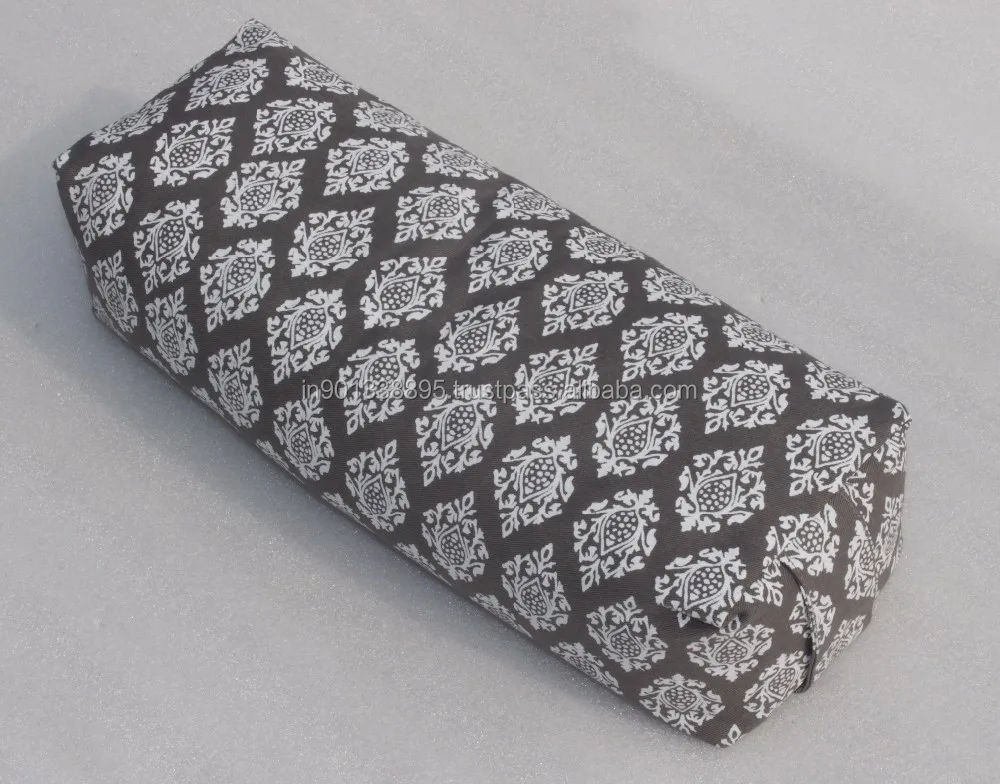 cotton or buckwheat filled saffron cylindrical bolster for yoga