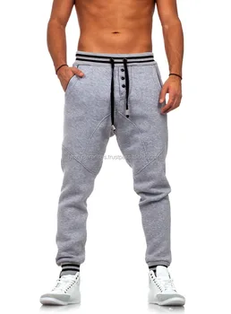 grey joggers with black stripe