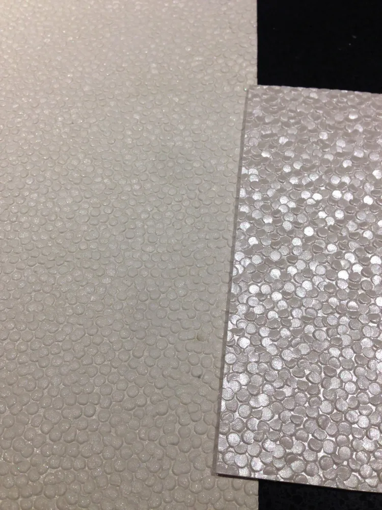 Pebble Embossed Handmade Papers In White Metallic Handmade Paper In