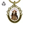 Classic Flora Pattern Oval Metal Custom Keychain
