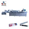 LX-100 automatic plastic wrap roll cartoning machine box carton packing machine with hot glue machine