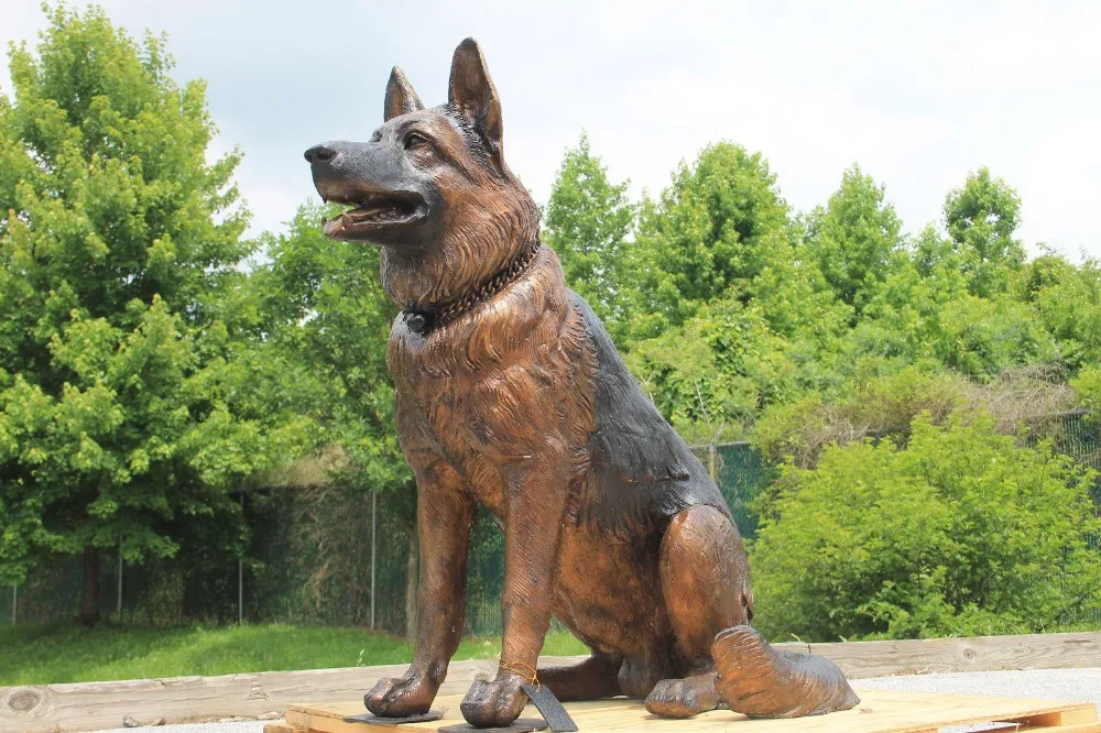 german shepherd puppy statue