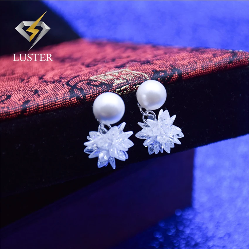 Fashionable design pearl sterling silver stamped 925 earring supplier