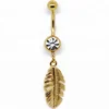 Navel gold feather dangle with clear gem belly button ring piercing