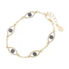 LOZRUNVE 18k Gold Plated Silver 925 Clear Sapphire CZ Multi Evil Eye Bracelet