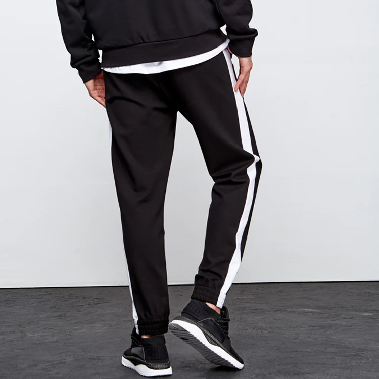 white sports track pants