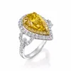 Fancy Vivid Yellow Diamond Pear Shape Ring in White Gold with Round Diamonds IGL 3.30ct