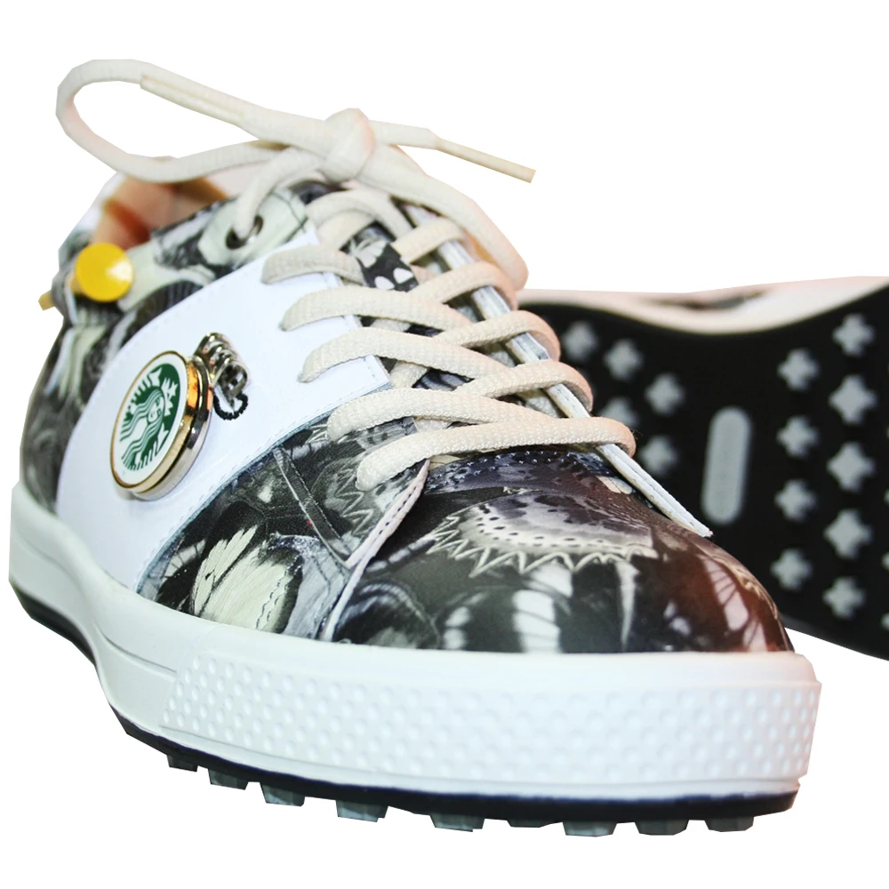 black and yellow golf shoes