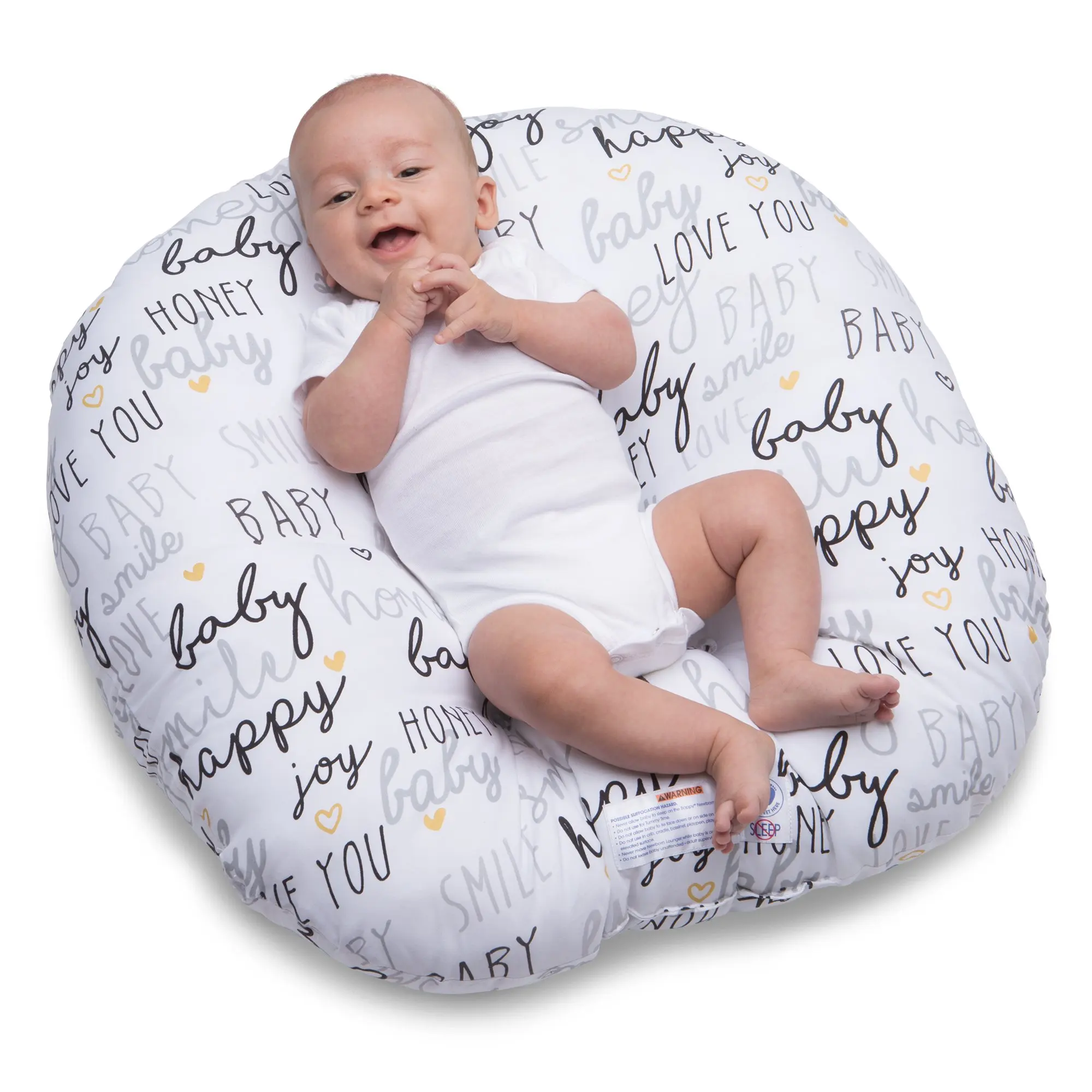 newborn sleeping on boppy lounger