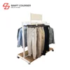 Modern portable clothing signs rack with clothes