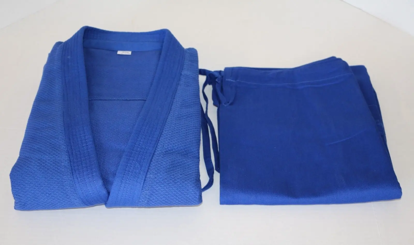 дзюдо ткань. дзюдо ткань. ткань для кимоно. Bjj uniforms. кимоно адидас для каратэ детское спина.